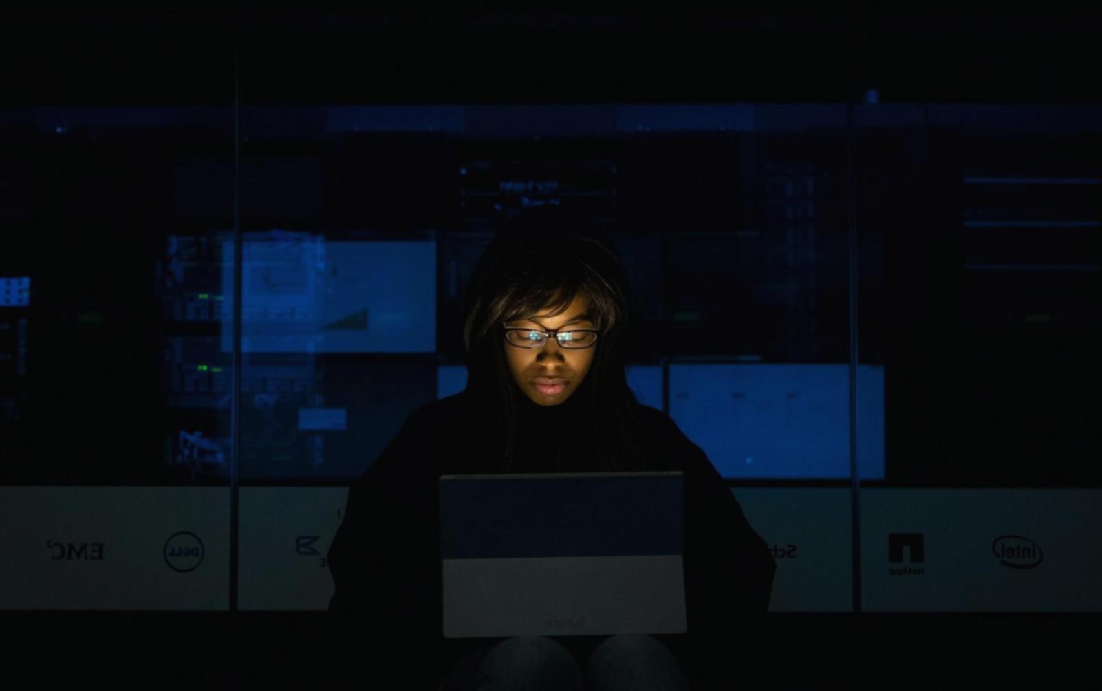 student workstation with multiple monitors displaying 3D environment projects